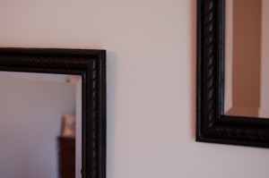 Frame detail on 2 small mirrors